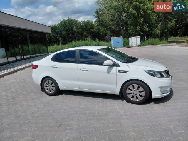 Белый Киа Рио, объемом двигателя 1.59 л и пробегом 181 тыс. км за 6599 $, фото 4 на Automoto.ua
