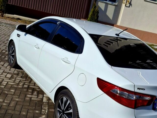 Белый Киа Рио, объемом двигателя 1.4 л и пробегом 87 тыс. км за 8750 $, фото 2 на Automoto.ua