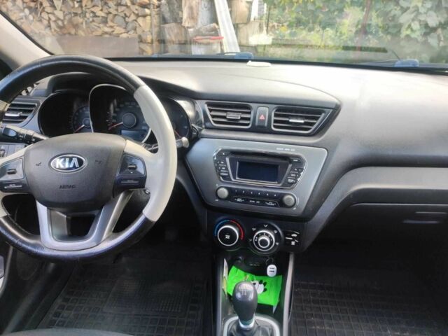 Білий Кіа Ріо, об'ємом двигуна 1.4 л та пробігом 265 тис. км за 5713 $, фото 7 на Automoto.ua