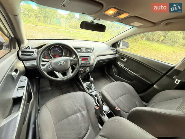 Білий Кіа Ріо, об'ємом двигуна 1.4 л та пробігом 299 тис. км за 5800 $, фото 13 на Automoto.ua