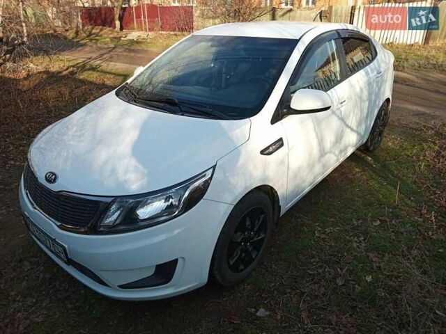 Білий Кіа Ріо, об'ємом двигуна 1.4 л та пробігом 87 тис. км за 8000 $, фото 13 на Automoto.ua