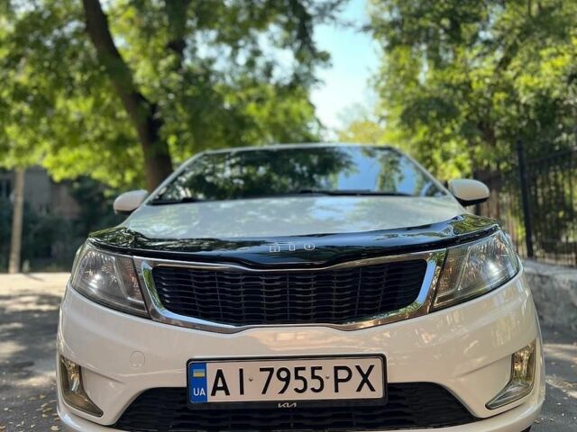 Белый Киа Рио, объемом двигателя 1.4 л и пробегом 218 тыс. км за 7600 $, фото 1 на Automoto.ua