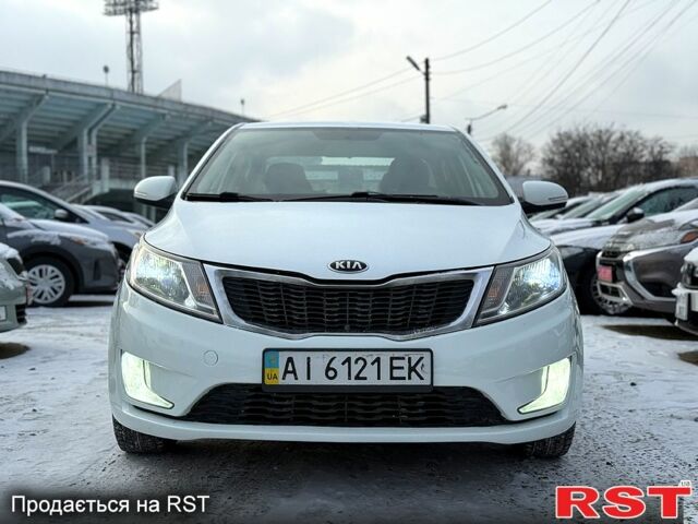 Білий Кіа Ріо, об'ємом двигуна 1.6 л та пробігом 14800 тис. км за 7800 $, фото 3 на Automoto.ua