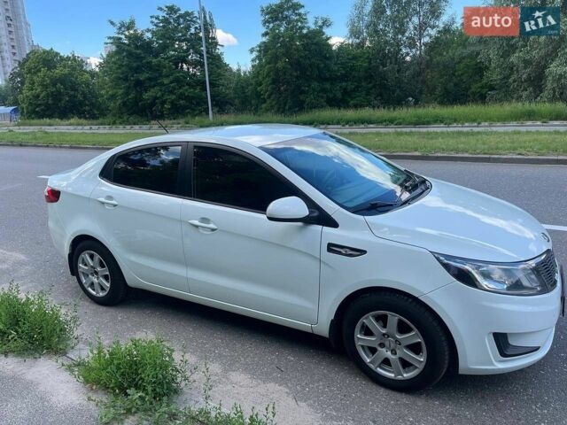 Білий Кіа Ріо, об'ємом двигуна 1.4 л та пробігом 132 тис. км за 6600 $, фото 12 на Automoto.ua