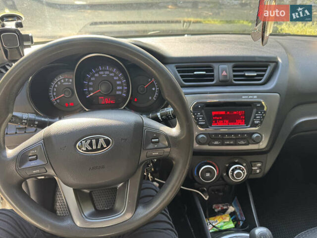 Білий Кіа Ріо, об'ємом двигуна 1.4 л та пробігом 84 тис. км за 9200 $, фото 12 на Automoto.ua