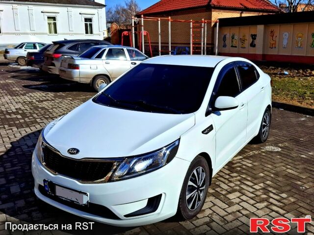 Білий Кіа Ріо, об'ємом двигуна 1.4 л та пробігом 87 тис. км за 8750 $, фото 2 на Automoto.ua