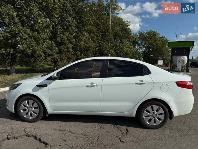 Білий Кіа Ріо, об'ємом двигуна 1.59 л та пробігом 106 тис. км за 8400 $, фото 2 на Automoto.ua