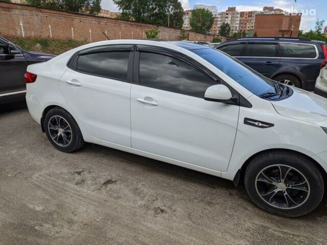 Белый Киа Рио, объемом двигателя 1.4 л и пробегом 55 тыс. км за 10200 $, фото 8 на Automoto.ua