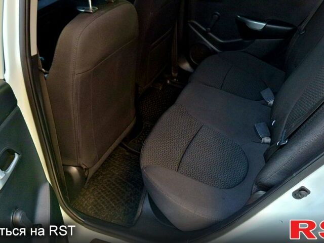 Білий Кіа Ріо, об'ємом двигуна 1.4 л та пробігом 87 тис. км за 8750 $, фото 10 на Automoto.ua