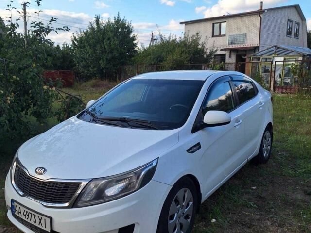 Білий Кіа Ріо, об'ємом двигуна 1.4 л та пробігом 265 тис. км за 5713 $, фото 3 на Automoto.ua