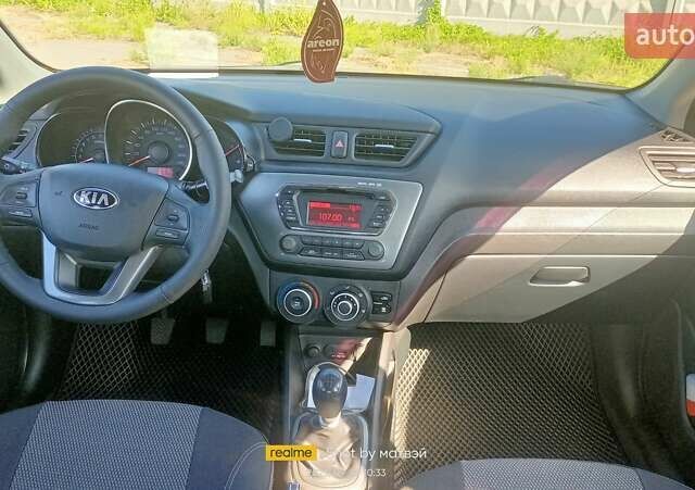 Белый Киа Рио, объемом двигателя 1.4 л и пробегом 83 тыс. км за 10200 $, фото 3 на Automoto.ua