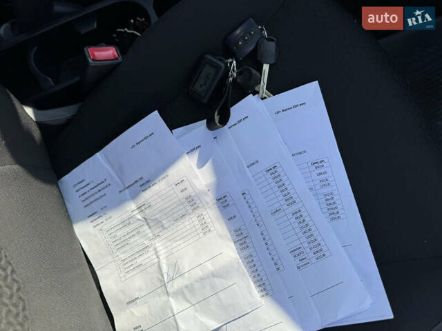 Білий Кіа Ріо, об'ємом двигуна 1.4 л та пробігом 185 тис. км за 6999 $, фото 26 на Automoto.ua