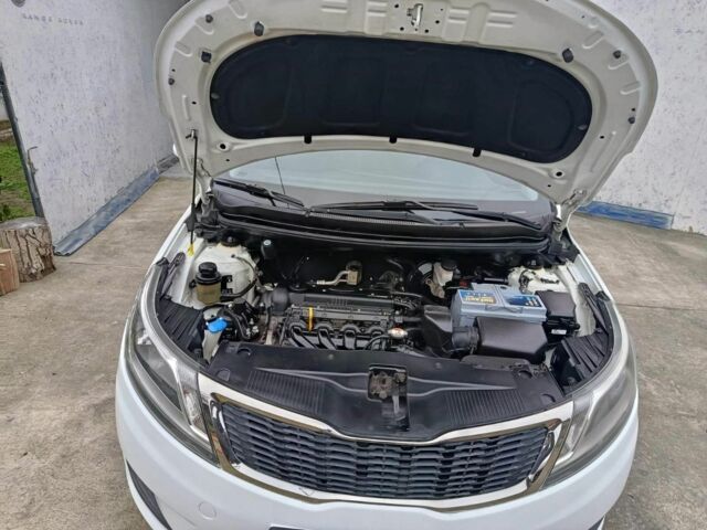 Белый Киа Рио, объемом двигателя 1.4 л и пробегом 110 тыс. км за 8500 $, фото 5 на Automoto.ua