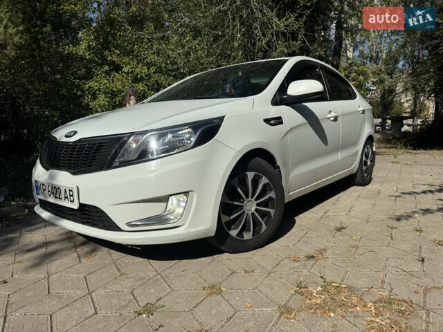 Білий Кіа Ріо, об'ємом двигуна 1.4 л та пробігом 84 тис. км за 9200 $, фото 9 на Automoto.ua