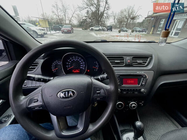 Білий Кіа Ріо, об'ємом двигуна 1.4 л та пробігом 210 тис. км за 6050 $, фото 12 на Automoto.ua