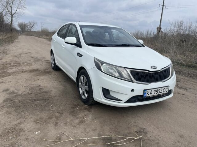 Білий Кіа Ріо, об'ємом двигуна 1.4 л та пробігом 210 тис. км за 5500 $, фото 1 на Automoto.ua