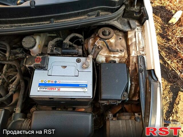 Білий Кіа Ріо, об'ємом двигуна 1.4 л та пробігом 87 тис. км за 7500 $, фото 9 на Automoto.ua