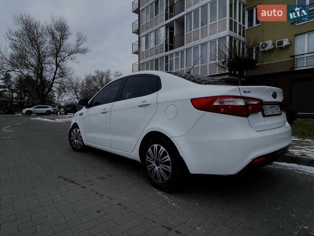 Білий Кіа Ріо, об'ємом двигуна 1.4 л та пробігом 210 тис. км за 6050 $, фото 3 на Automoto.ua