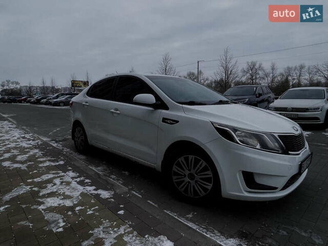 Білий Кіа Ріо, об'ємом двигуна 1.4 л та пробігом 210 тис. км за 6050 $, фото 8 на Automoto.ua