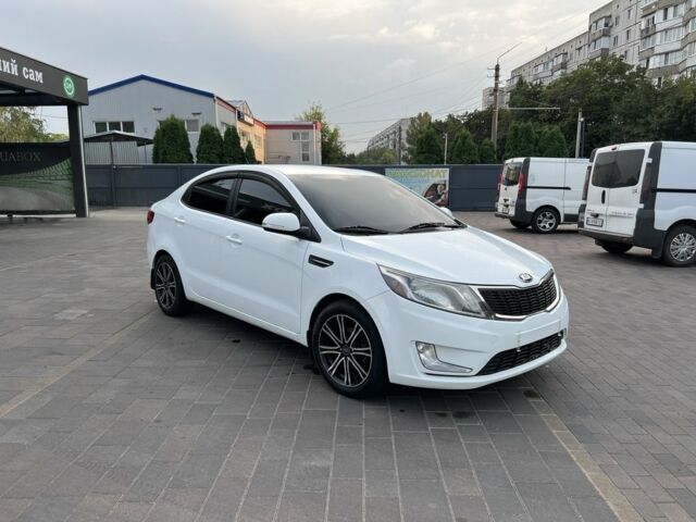 Белый Киа Рио, объемом двигателя 1.6 л и пробегом 243 тыс. км за 5735 $, фото 2 на Automoto.ua
