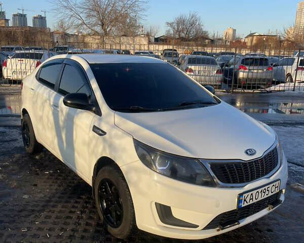Білий Кіа Ріо, об'ємом двигуна 1.4 л та пробігом 248 тис. км за 7499 $, фото 2 на Automoto.ua