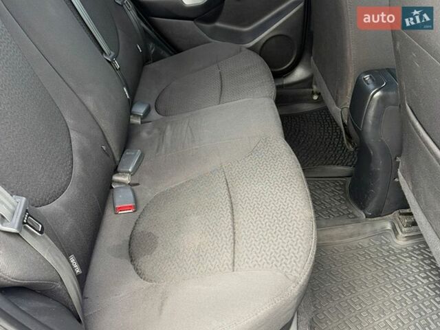 Білий Кіа Ріо, об'ємом двигуна 1.4 л та пробігом 125 тис. км за 7800 $, фото 6 на Automoto.ua