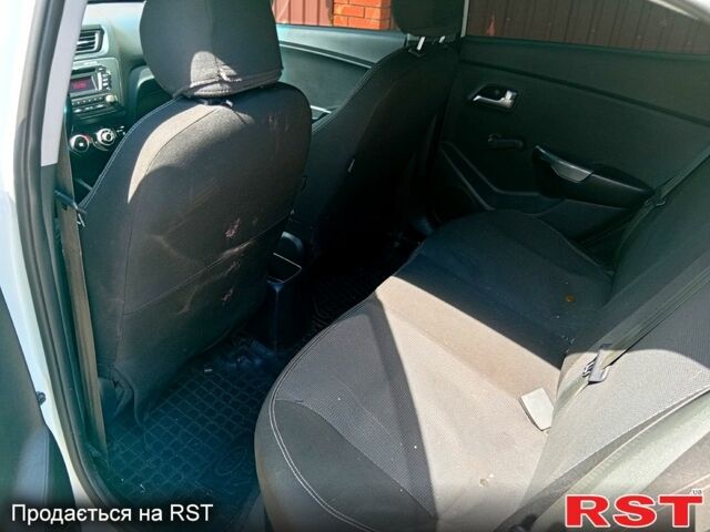 Білий Кіа Ріо, об'ємом двигуна 1.4 л та пробігом 213 тис. км за 7800 $, фото 9 на Automoto.ua