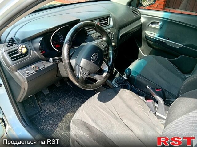 Білий Кіа Ріо, об'ємом двигуна 1.4 л та пробігом 213 тис. км за 7800 $, фото 7 на Automoto.ua