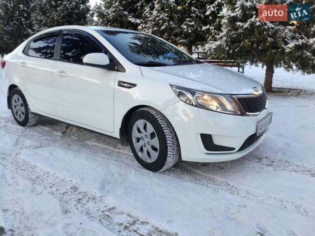 Белый Киа Рио, объемом двигателя 1.4 л и пробегом 144 тыс. км за 7700 $, фото 5 на Automoto.ua