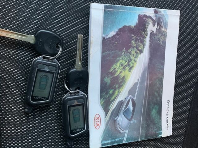 Белый Киа Рио, объемом двигателя 1.4 л и пробегом 216 тыс. км за 8555 $, фото 13 на Automoto.ua