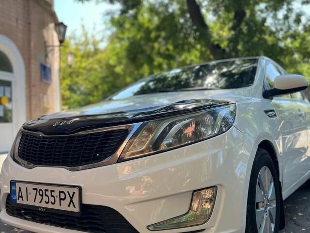 Белый Киа Рио, объемом двигателя 1.4 л и пробегом 218 тыс. км за 7600 $, фото 4 на Automoto.ua