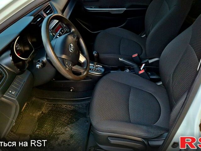 Білий Кіа Ріо, об'ємом двигуна 1.4 л та пробігом 87 тис. км за 8750 $, фото 11 на Automoto.ua