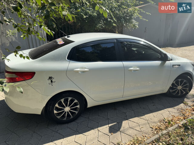Белый Киа Рио, объемом двигателя 1.4 л и пробегом 94 тыс. км за 8700 $, фото 2 на Automoto.ua