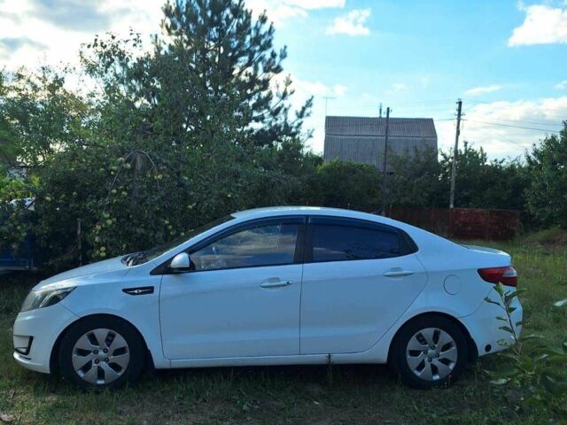 Білий Кіа Ріо, об'ємом двигуна 1.4 л та пробігом 265 тис. км за 5713 $, фото 2 на Automoto.ua