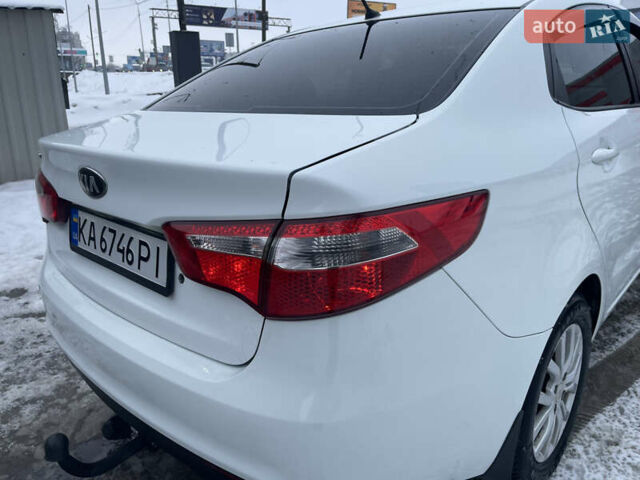 Білий Кіа Ріо, об'ємом двигуна 1.4 л та пробігом 216 тис. км за 7850 $, фото 14 на Automoto.ua