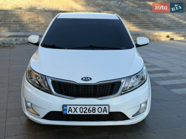 Белый Киа Рио, объемом двигателя 1.4 л и пробегом 185 тыс. км за 6700 $, фото 2 на Automoto.ua