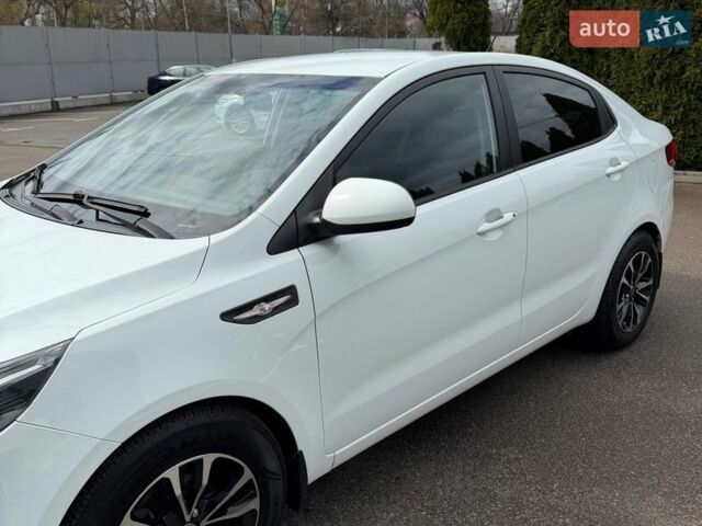 Білий Кіа Ріо, об'ємом двигуна 1.4 л та пробігом 139 тис. км за 8200 $, фото 19 на Automoto.ua