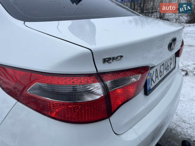 Білий Кіа Ріо, об'ємом двигуна 1.4 л та пробігом 216 тис. км за 7850 $, фото 15 на Automoto.ua