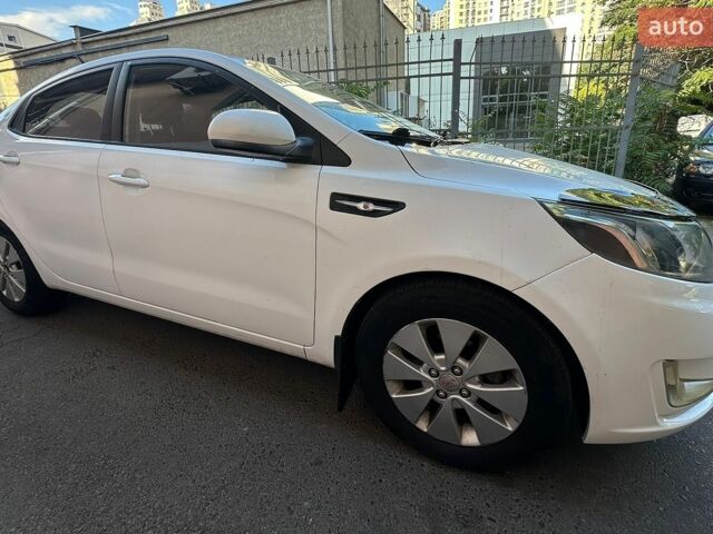Білий Кіа Ріо, об'ємом двигуна 1.4 л та пробігом 214 тис. км за 6600 $, фото 5 на Automoto.ua
