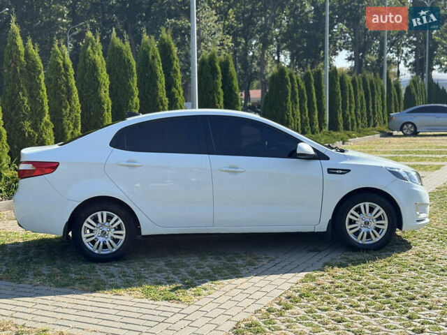 Білий Кіа Ріо, об'ємом двигуна 1.4 л та пробігом 185 тис. км за 6999 $, фото 6 на Automoto.ua