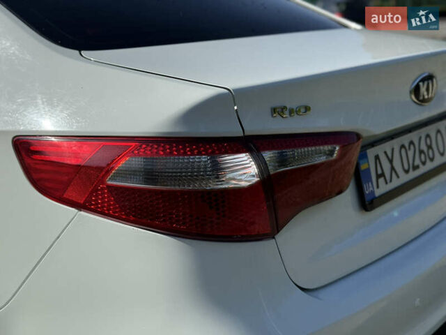Білий Кіа Ріо, об'ємом двигуна 1.4 л та пробігом 185 тис. км за 6999 $, фото 11 на Automoto.ua