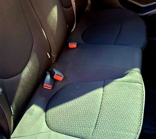 Білий Кіа Ріо, об'ємом двигуна 1.4 л та пробігом 87 тис. км за 8750 $, фото 13 на Automoto.ua