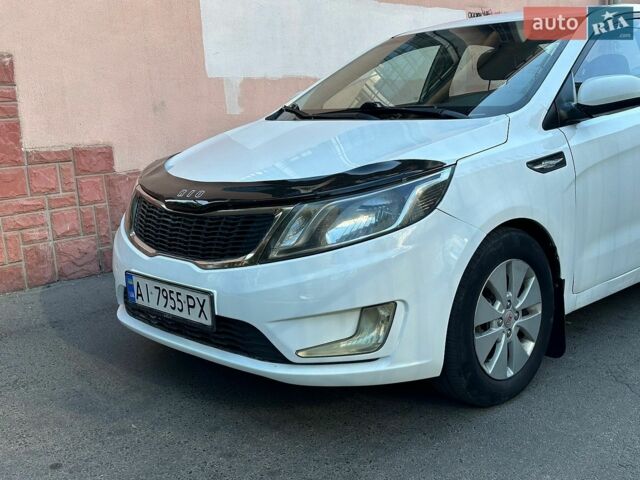Білий Кіа Ріо, об'ємом двигуна 1.4 л та пробігом 214 тис. км за 6600 $, фото 2 на Automoto.ua