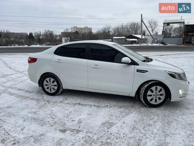 Белый Киа Рио, объемом двигателя 1.6 л и пробегом 148 тыс. км за 7550 $, фото 1 на Automoto.ua