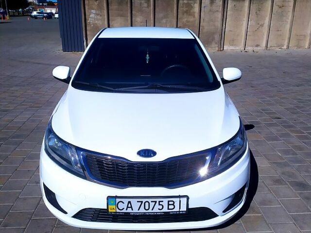Білий Кіа Ріо, об'ємом двигуна 1.4 л та пробігом 165 тис. км за 7300 $, фото 7 на Automoto.ua