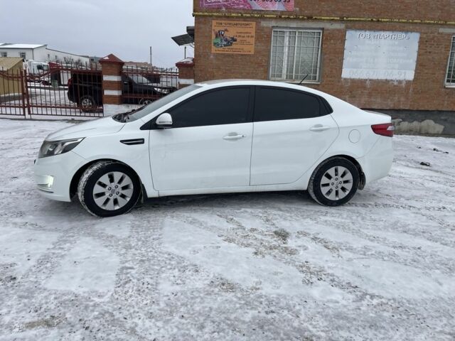 Білий Кіа Ріо, об'ємом двигуна 1.6 л та пробігом 148 тис. км за 7550 $, фото 2 на Automoto.ua
