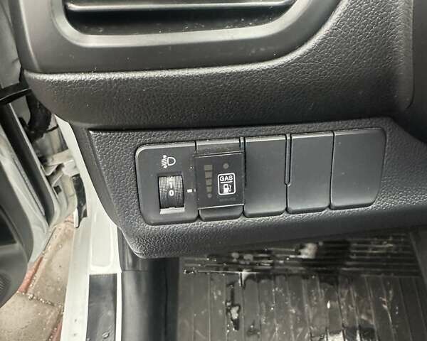 Білий Кіа Ріо, об'ємом двигуна 1.4 л та пробігом 121 тис. км за 8700 $, фото 8 на Automoto.ua