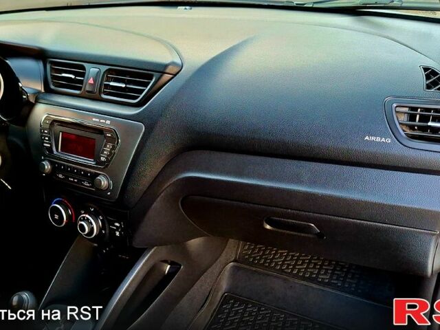 Білий Кіа Ріо, об'ємом двигуна 1.4 л та пробігом 87 тис. км за 8750 $, фото 6 на Automoto.ua