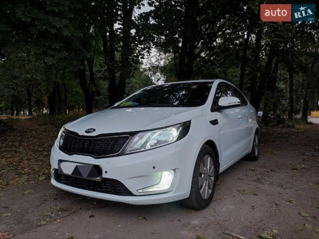 Белый Киа Рио, объемом двигателя 1.59 л и пробегом 172 тыс. км за 9000 $, фото 1 на Automoto.ua