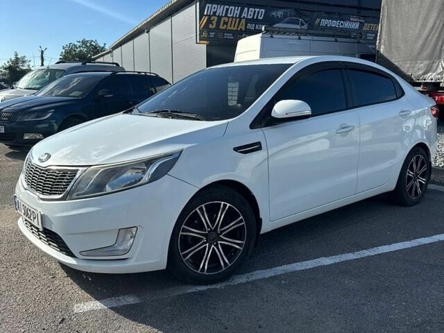 Белый Киа Рио, объемом двигателя 1.59 л и пробегом 244 тыс. км за 6500 $, фото 2 на Automoto.ua